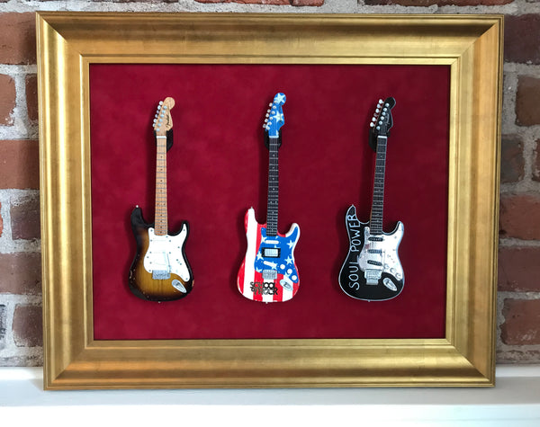 22” x 18” - 3 x Mini Guitar Display Frame - Deep Red Suede - Warm Gold Leafing 2 1/4” Wood Frame