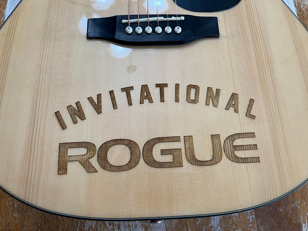 Custom laser engraving on acoustic guitar